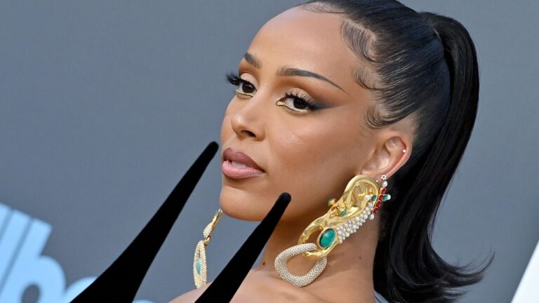 Doja Cat Wears False Eyelashes As Facial Hair, And Rocks It