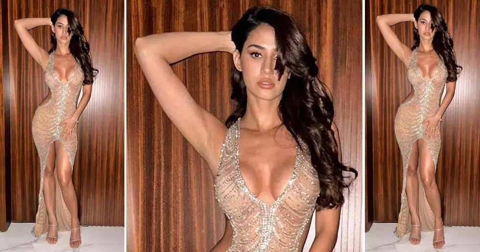 Disha Patani stuns in a shimmery bodycon cut-out robe. See pics: